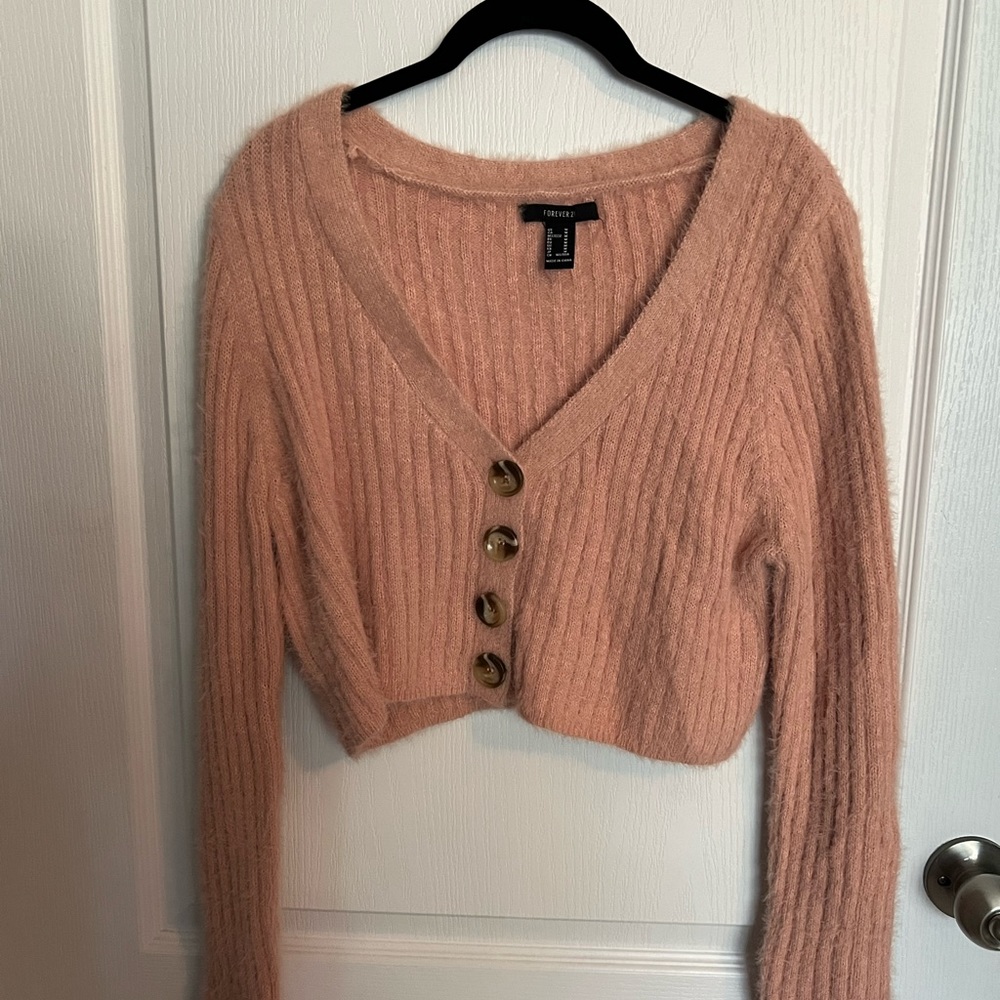 cropped pink button-up knit sweater